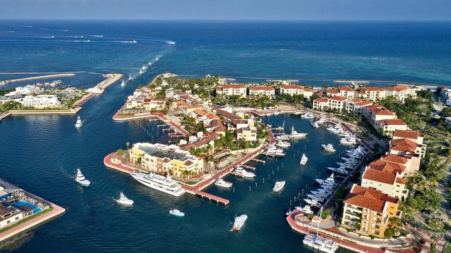 Aerial view of Marina Cap Cana with luxury yachts and waterfront residences